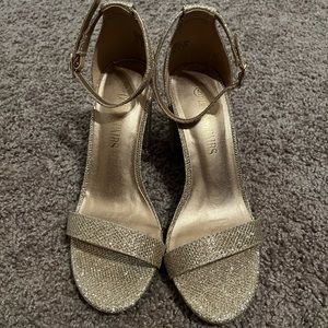 Gold glitter high heels